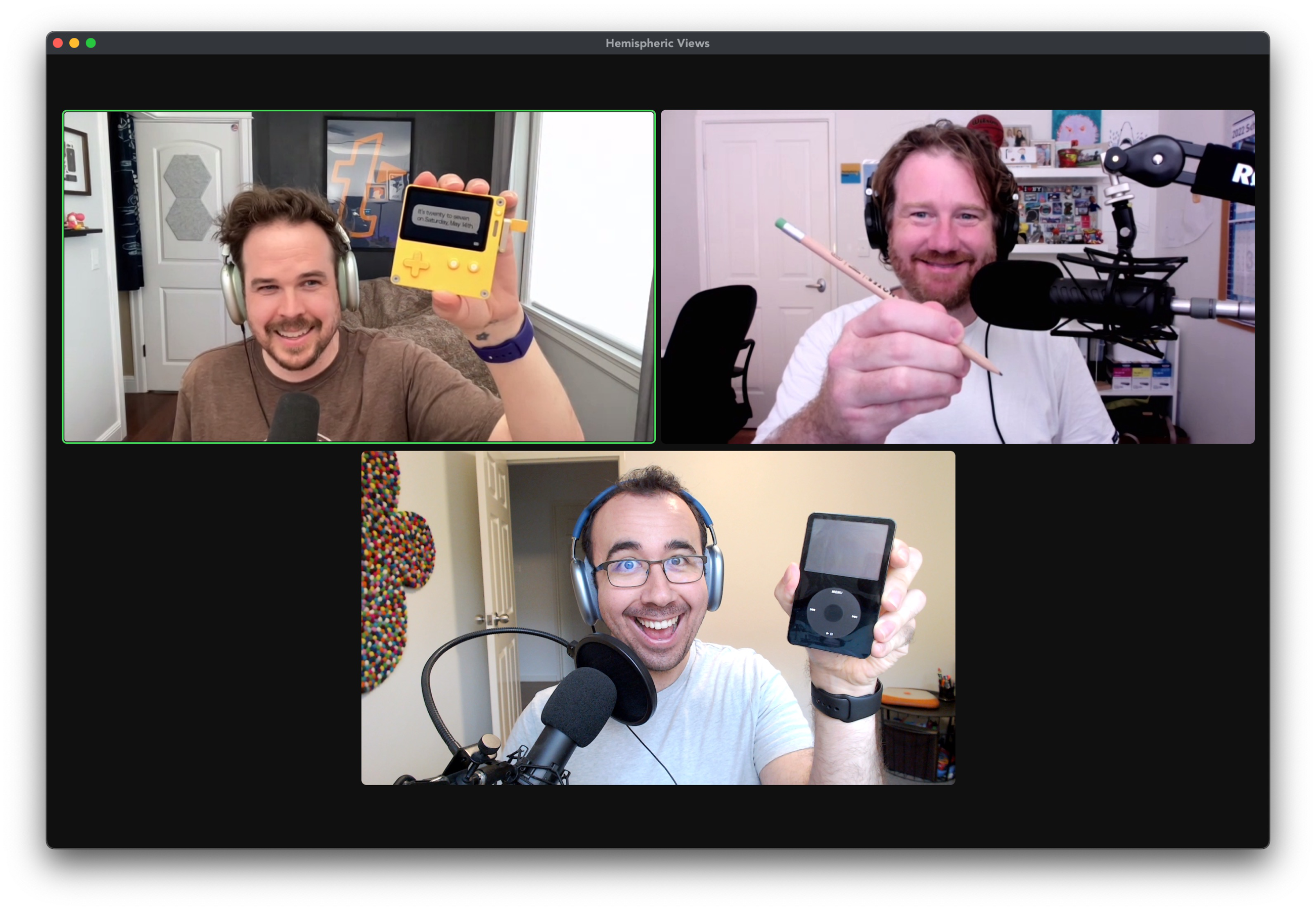 Zoom call screenshot with three smiling hosts holding devices